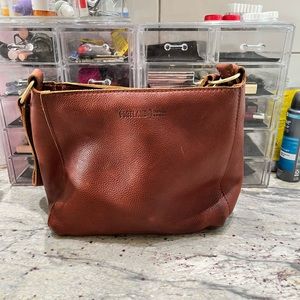 Portland leather triangle AP bag.